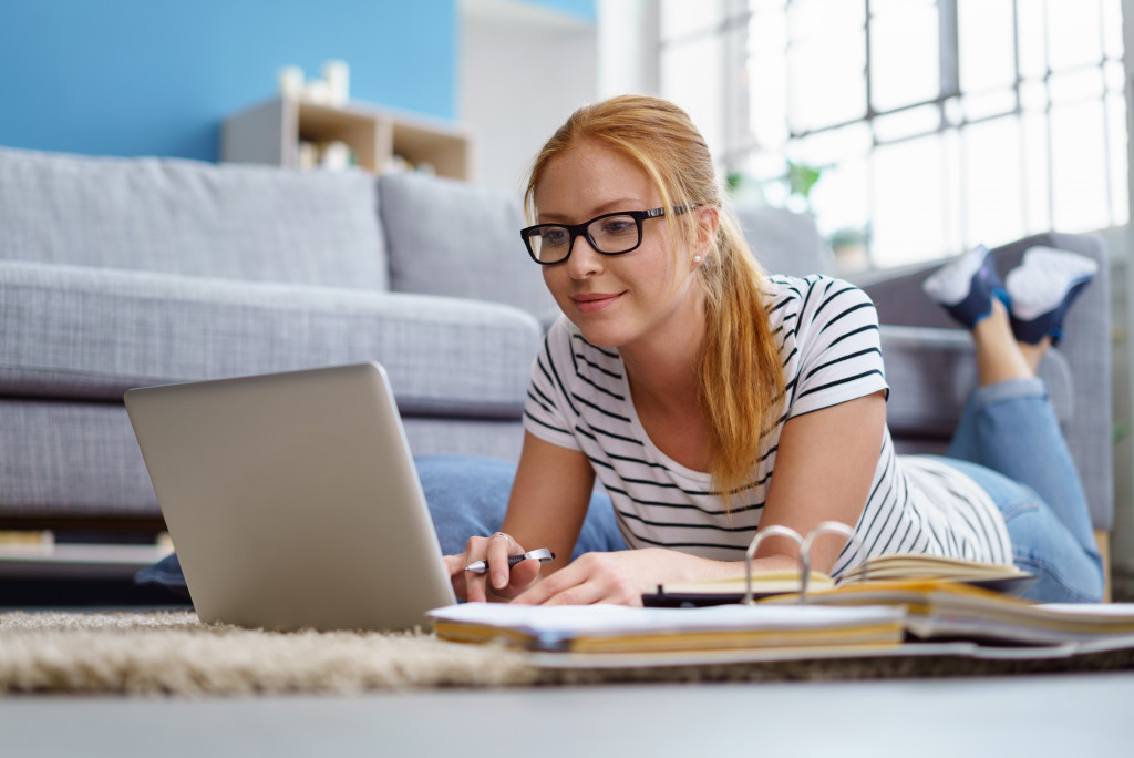 a teen using a computer studying