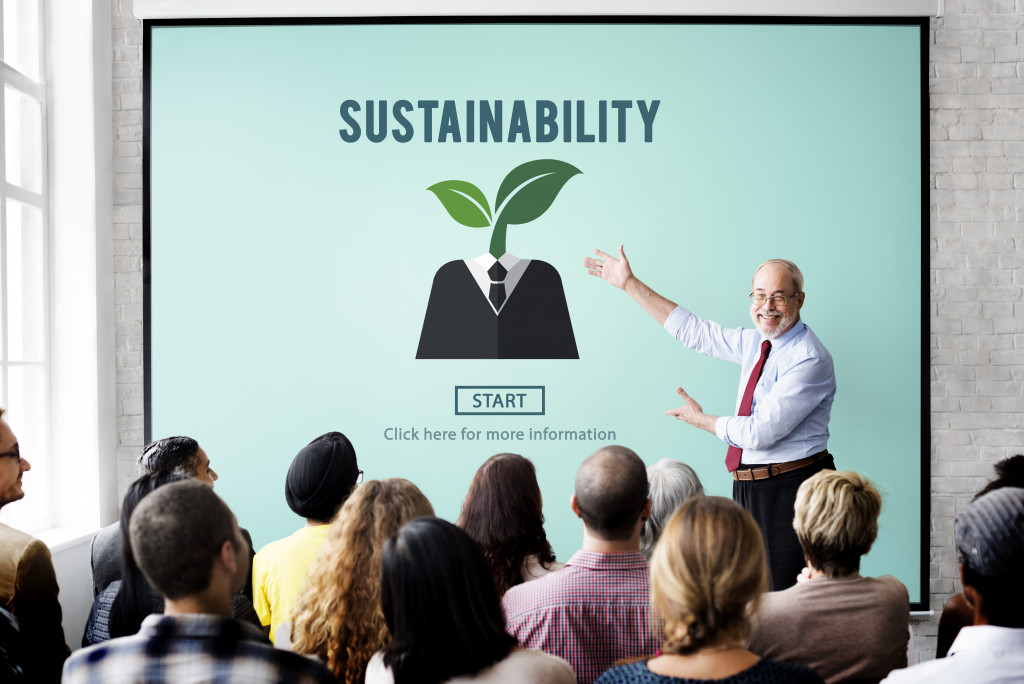 An entrepreneur teaching his employees about sustainability