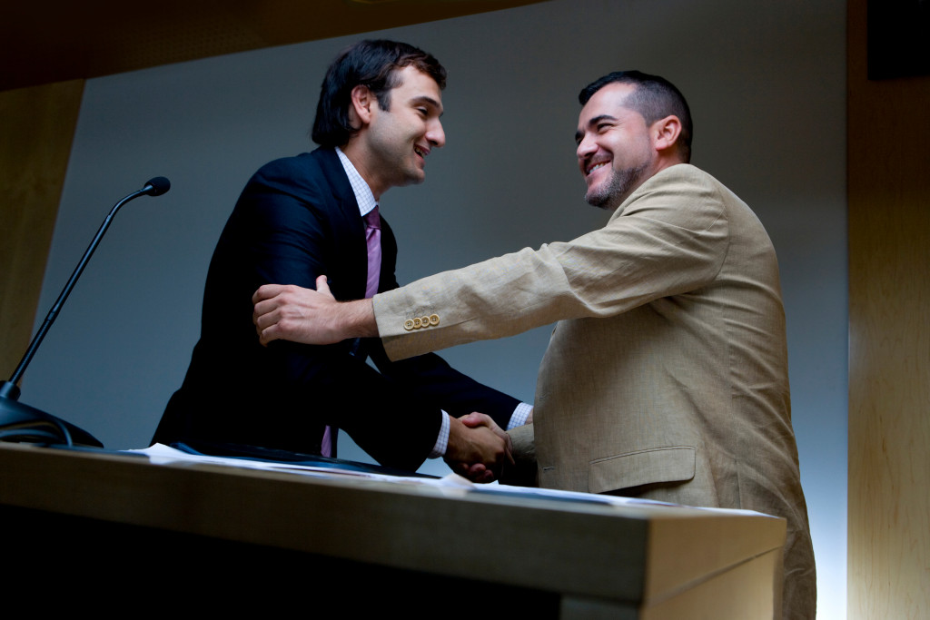 Speakers making eye contact during a presentation